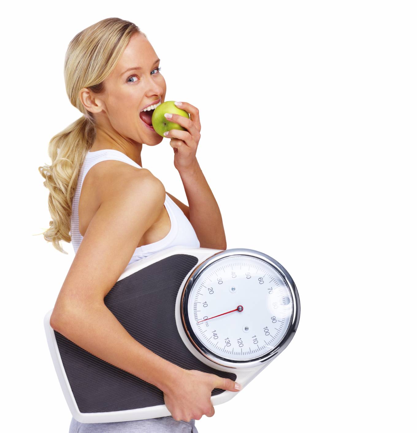 Woman doing HcG Diet holding scales and happy after treatment by weight loss naturopath